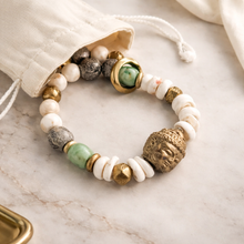 BEAUTIFUL SOUL - CARVED QUAN YIN W/CONCH BEADS