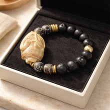 BEAUTIFUL SOUL - VINTAGE HAND-CARVED TAGUA NUT GANESH WITH MOROCCAN CLAY BEADS - BRACELET