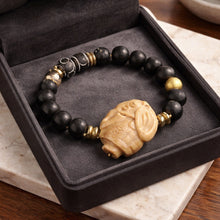 BEAUTIFUL SOUL - VINTAGE HAND-CARVED TAGUA NUT GANESH WITH MOROCCAN CLAY BEADS - BRACELET